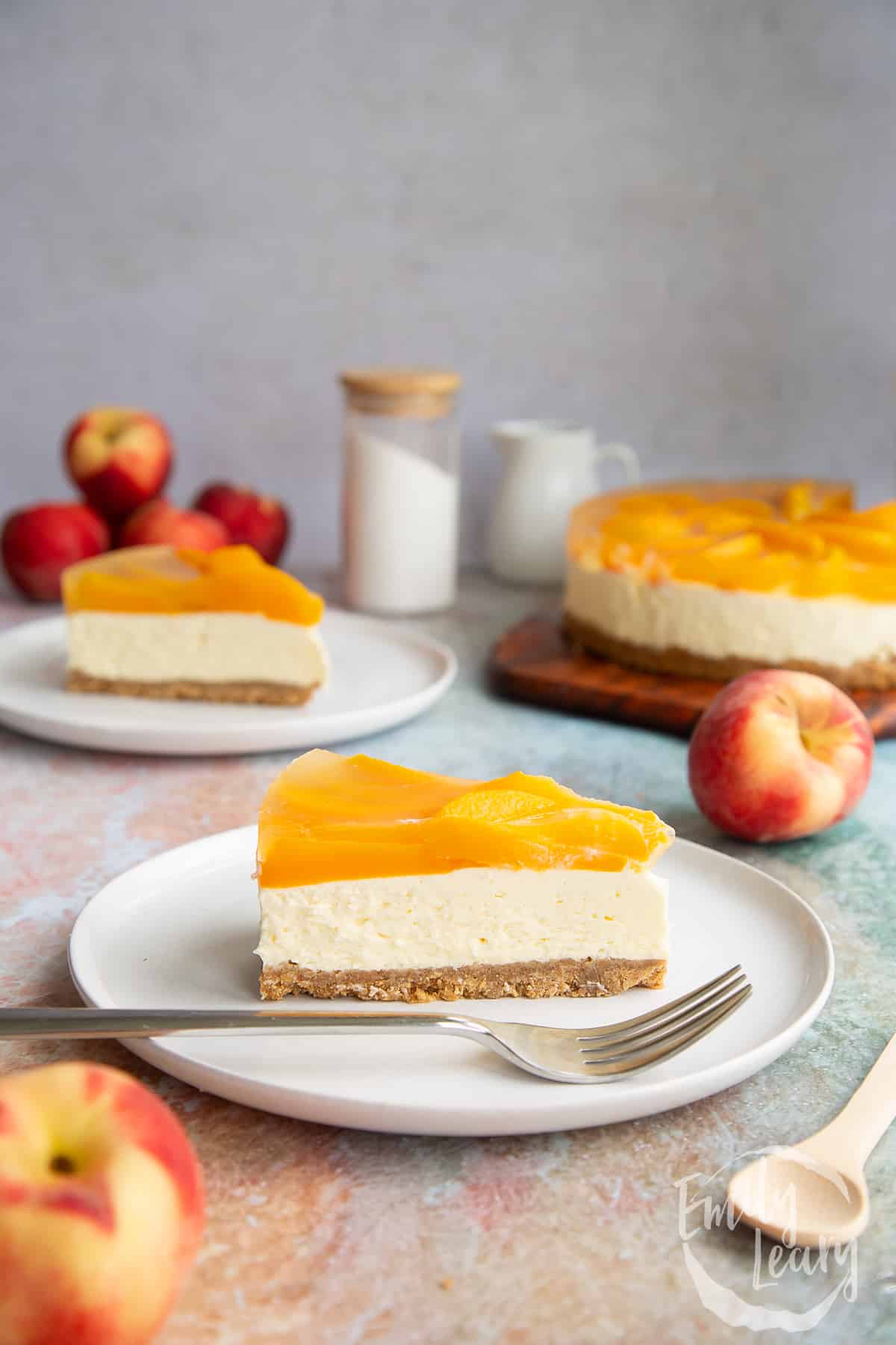 a slice of peach cheesecake.