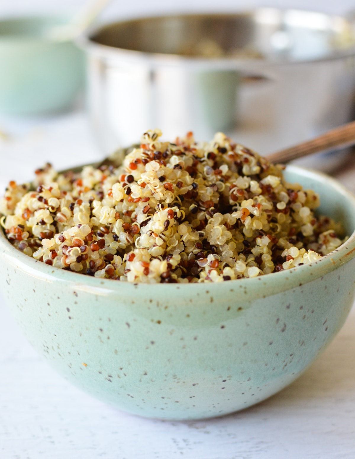 a bowl of cooked tri-color quinoa.