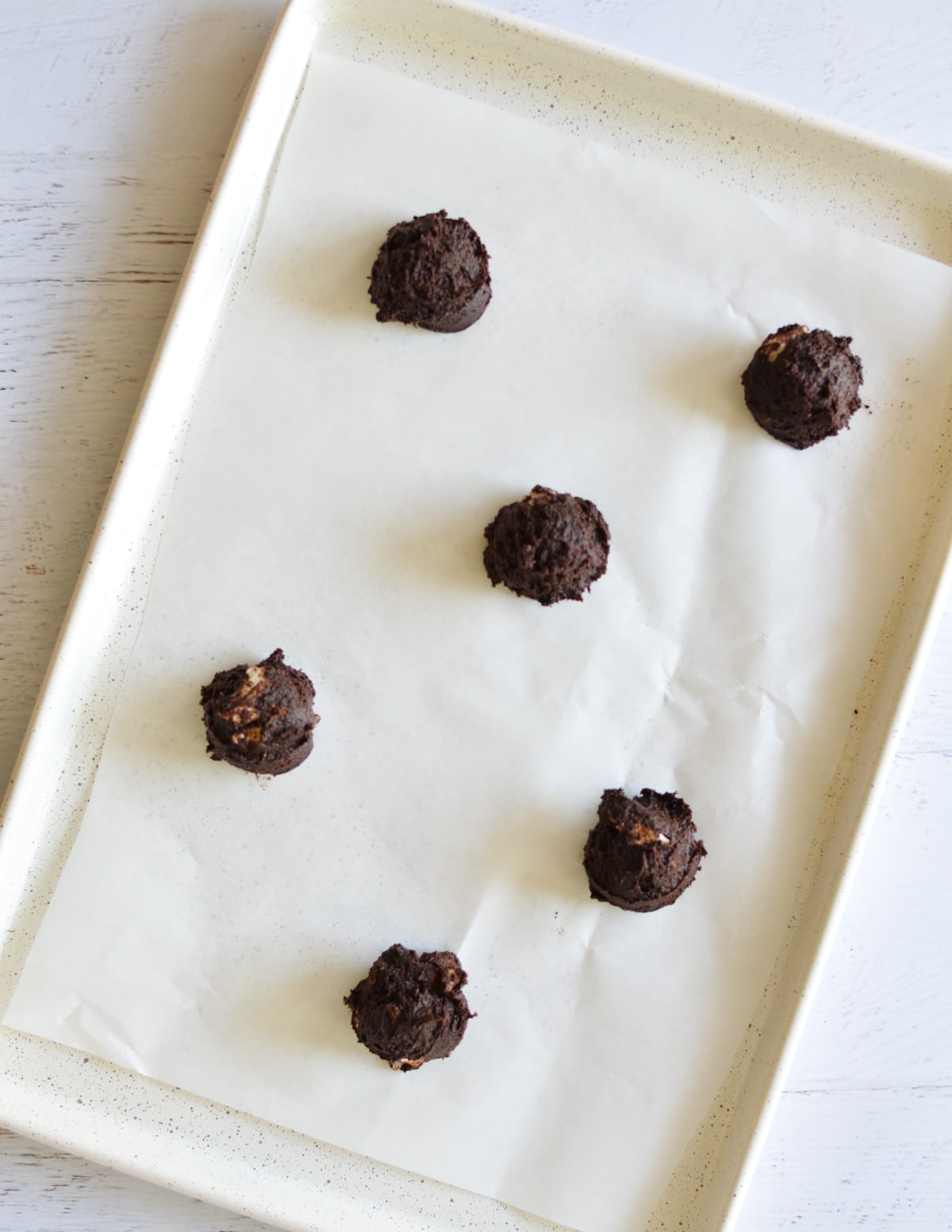 chocolate marshmallow cookies on a sheet pan.