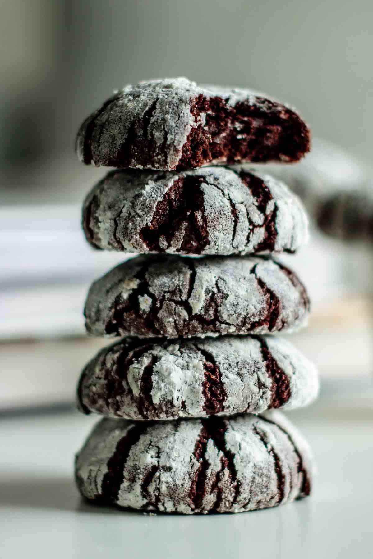 a stack of chocolate crinkle cookies.