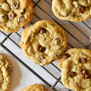 oat flour chocolate chip cookies on wire rack.