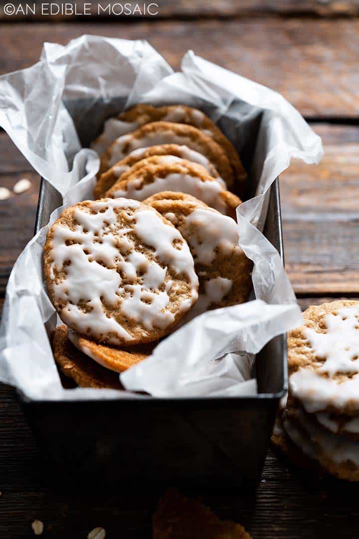 iced oatmeal cookies in a baking pan. 