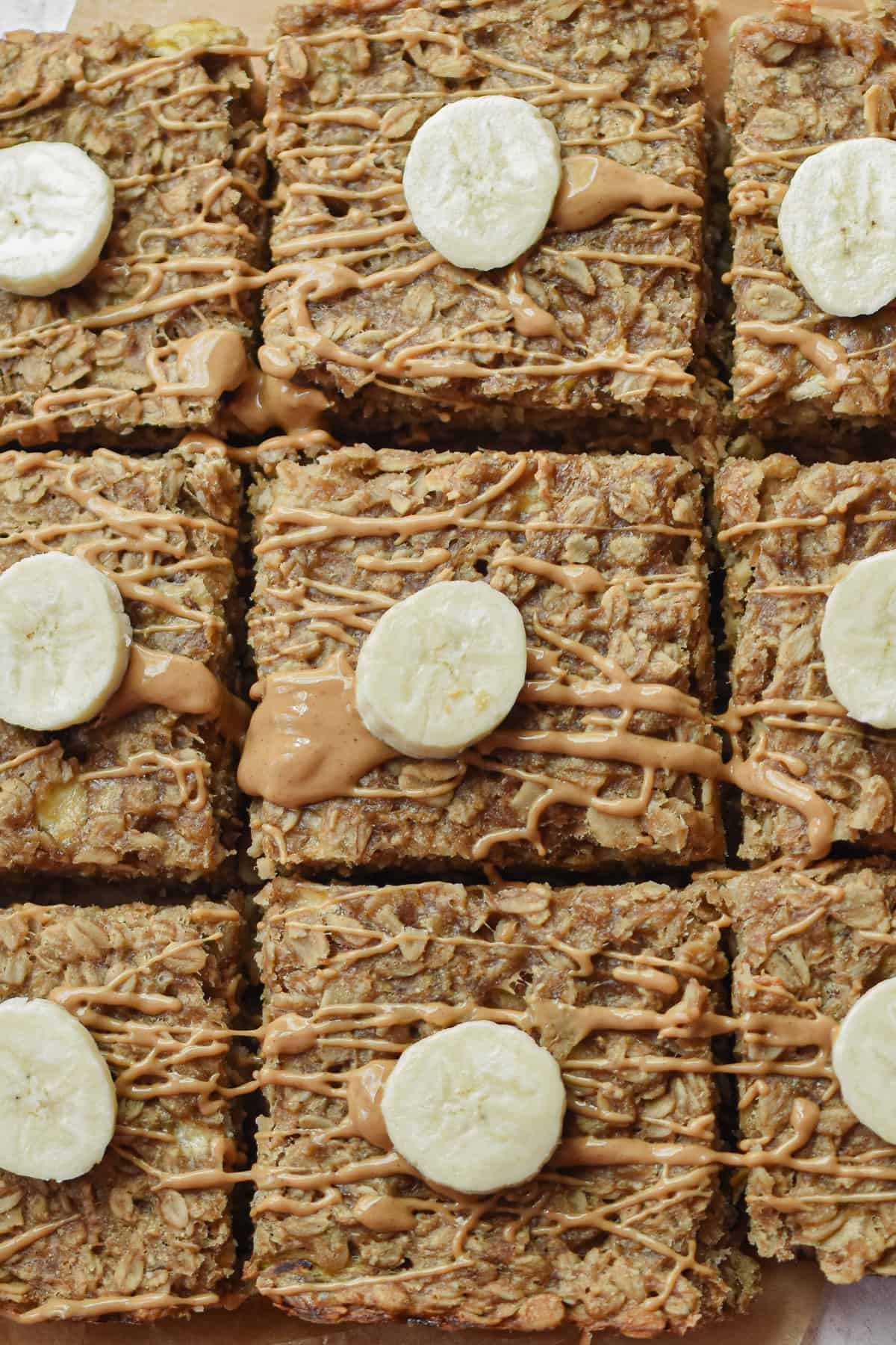 banana oatmeal bars with a slice of banana on top.