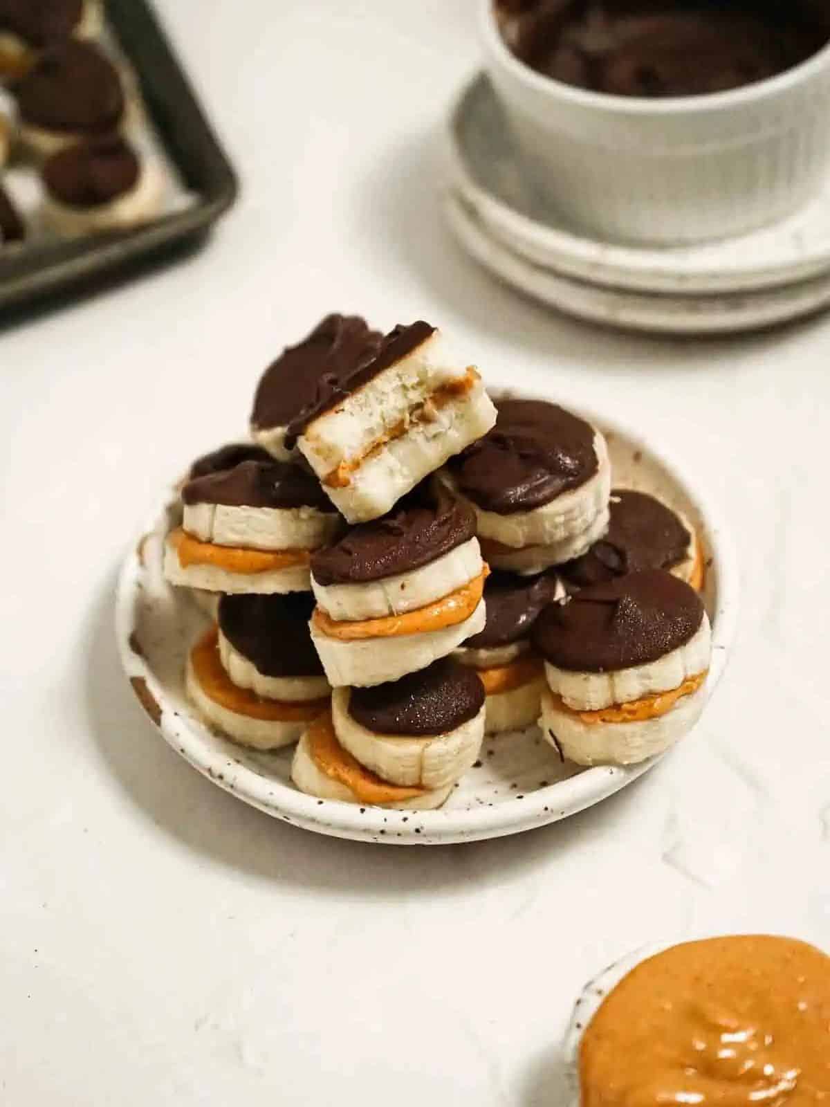 banana and peanut butter sandwiches dipped in chocolate.