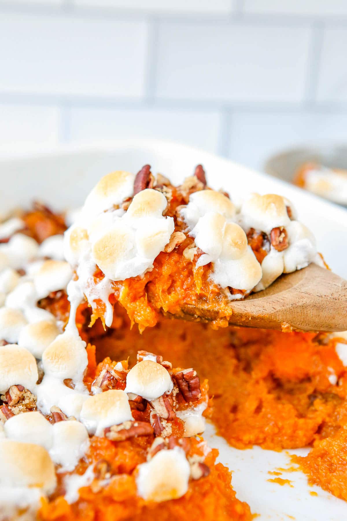 a scoop of sweet potato casserole.