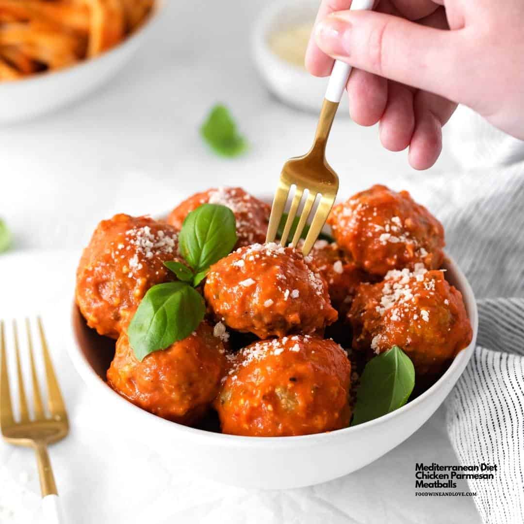 a fork of parmesan meatballs 