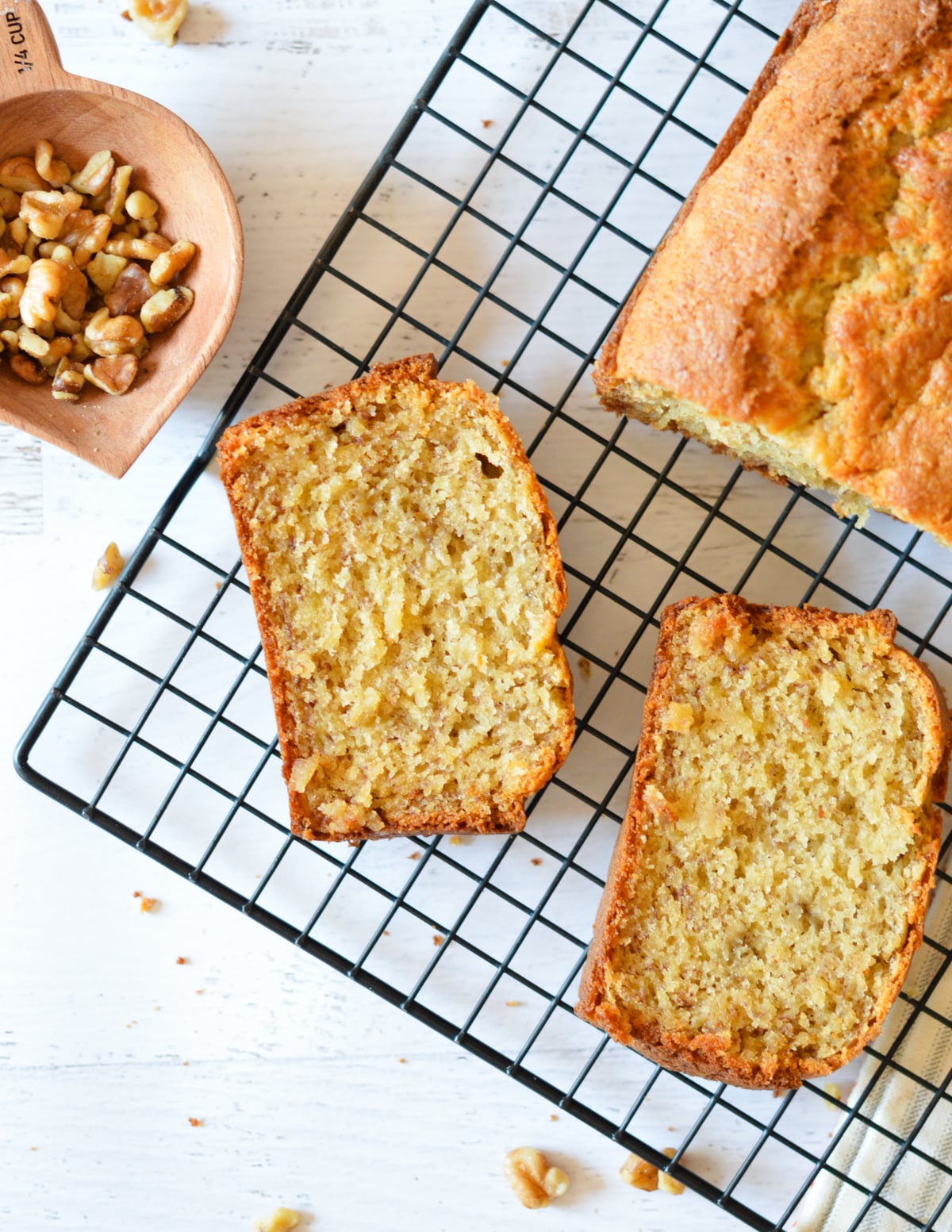 banana bread slices on a cooling rack.