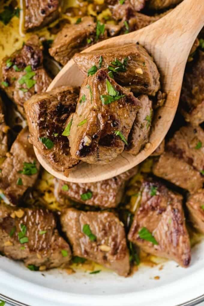 a spoonful of steak bites. 