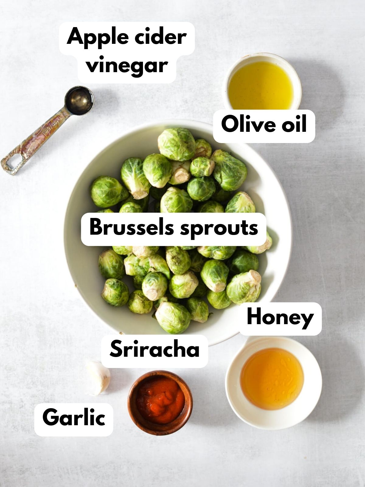 olive oil, honey, brussels sprouts, apple cider vinegar, sriracha, garlic. 