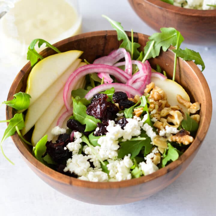 arugula salad with pears, walnuts, and goat cheese.
