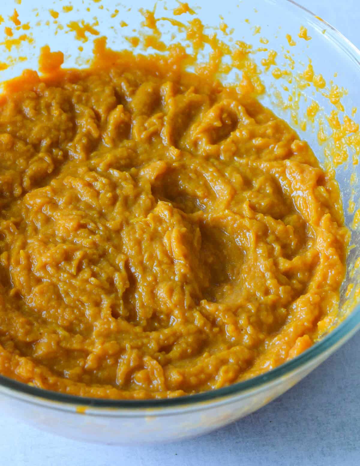 a bowl of sweet potato casserole filling.