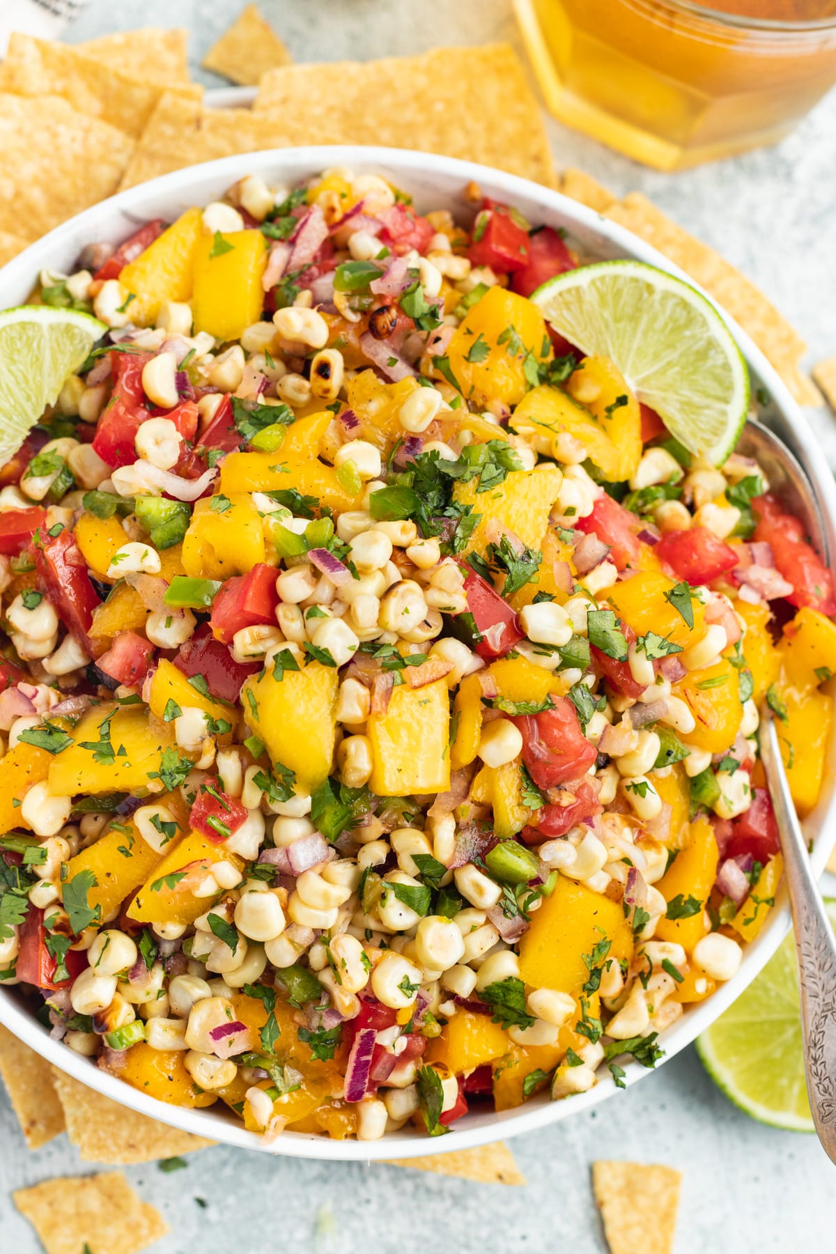 a bowl of mango and grilled corn salsa. 