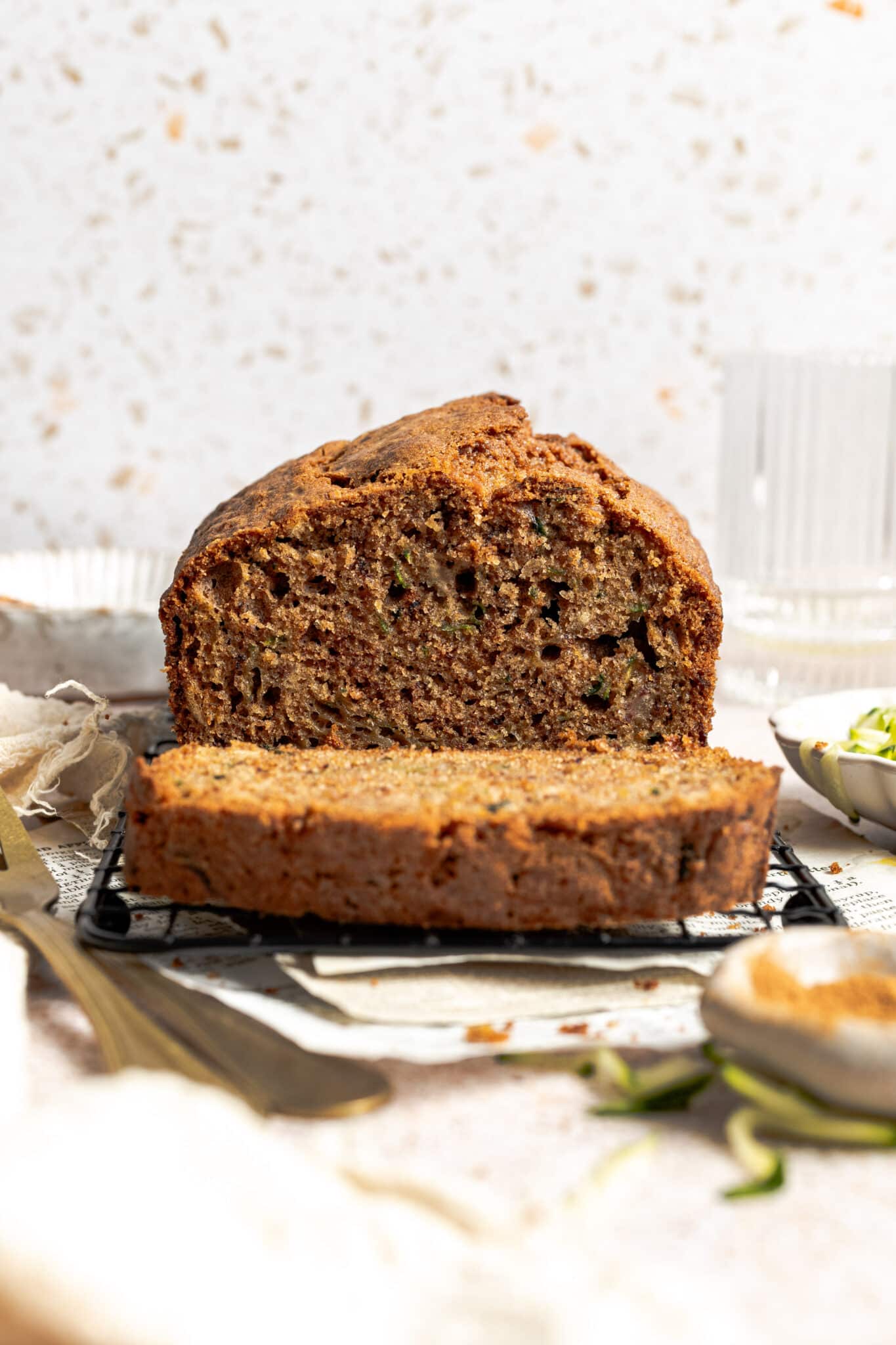 a loaf of zucchini bread with a slice cut