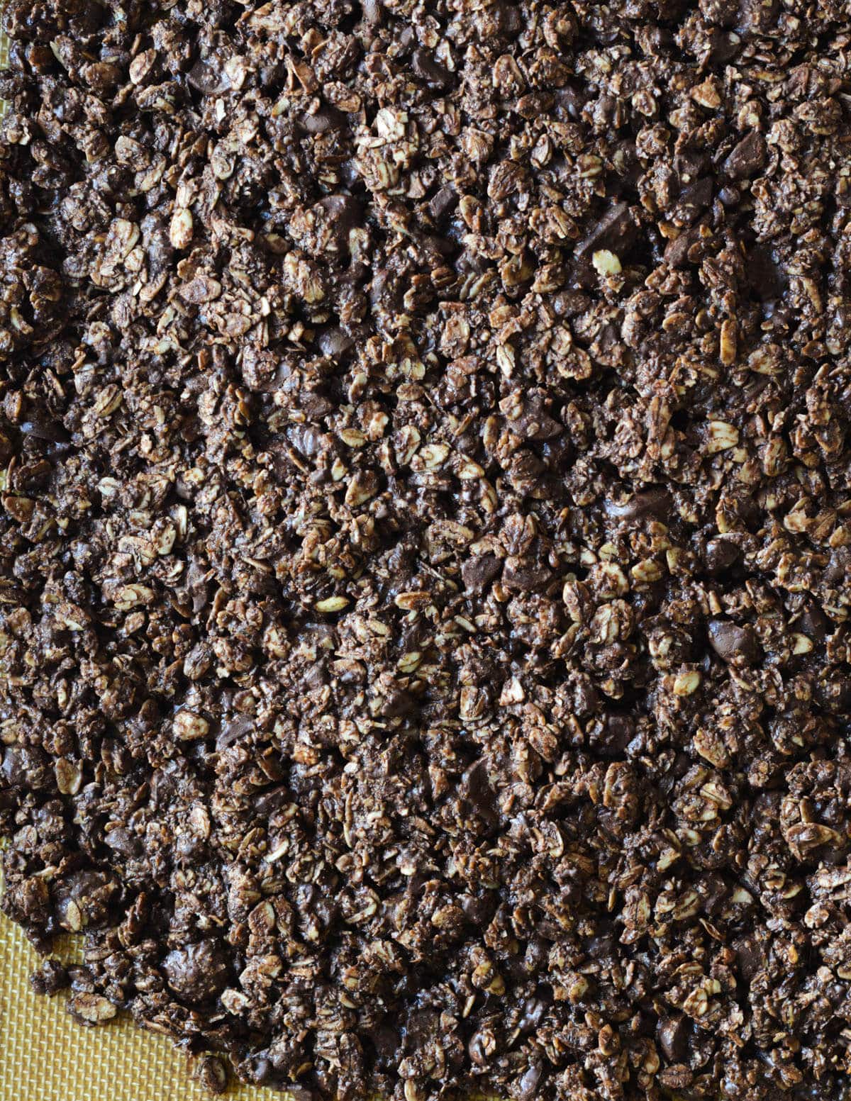 baked chocolate granola on sheet pan.