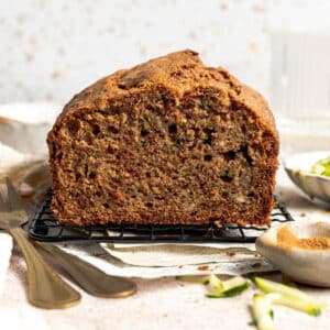 zucchini bread on a wire rack.