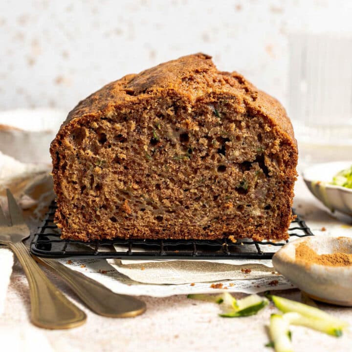 zucchini bread on a wire rack.