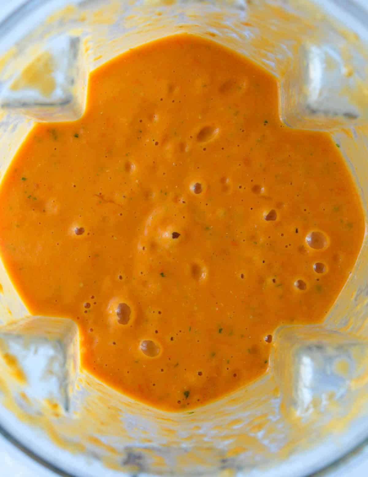 roasted cherry tomato soup in a blender.