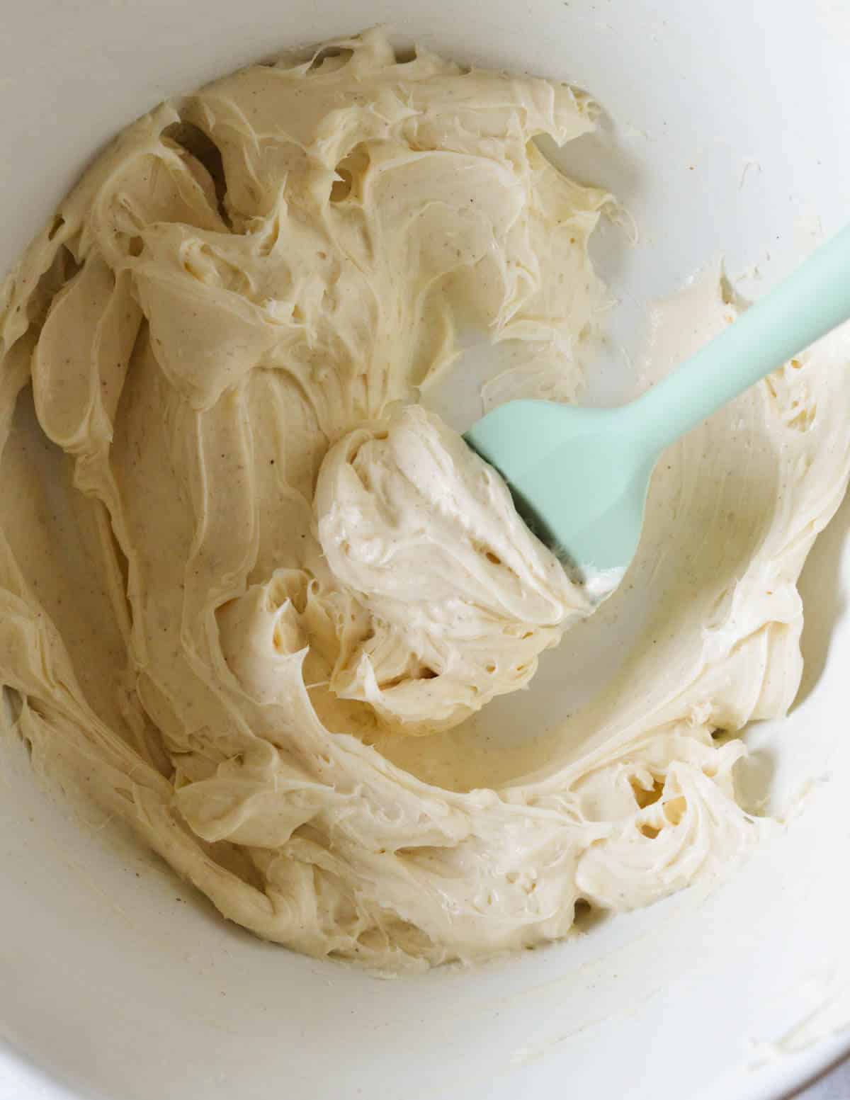 whipped honey cream cheese in a bowl.