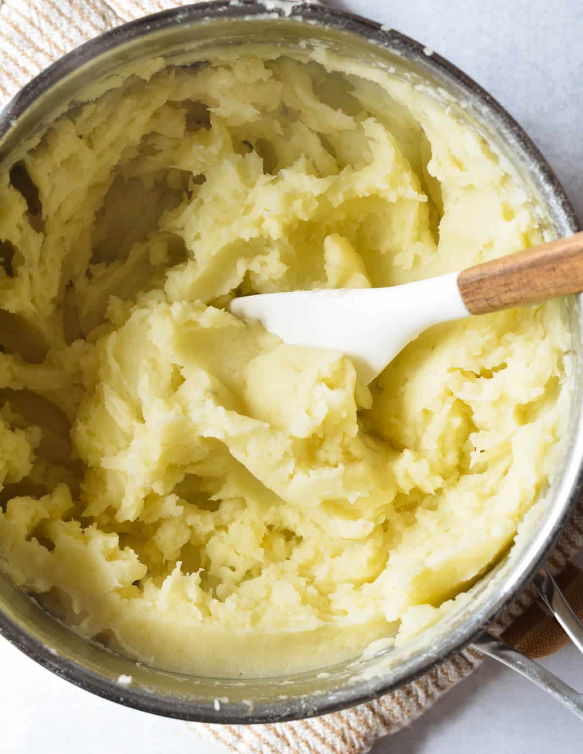 top down shot of mashed potatoes in a pot.