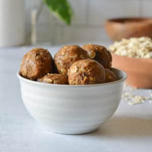 a bowl of almond butter energy balls.