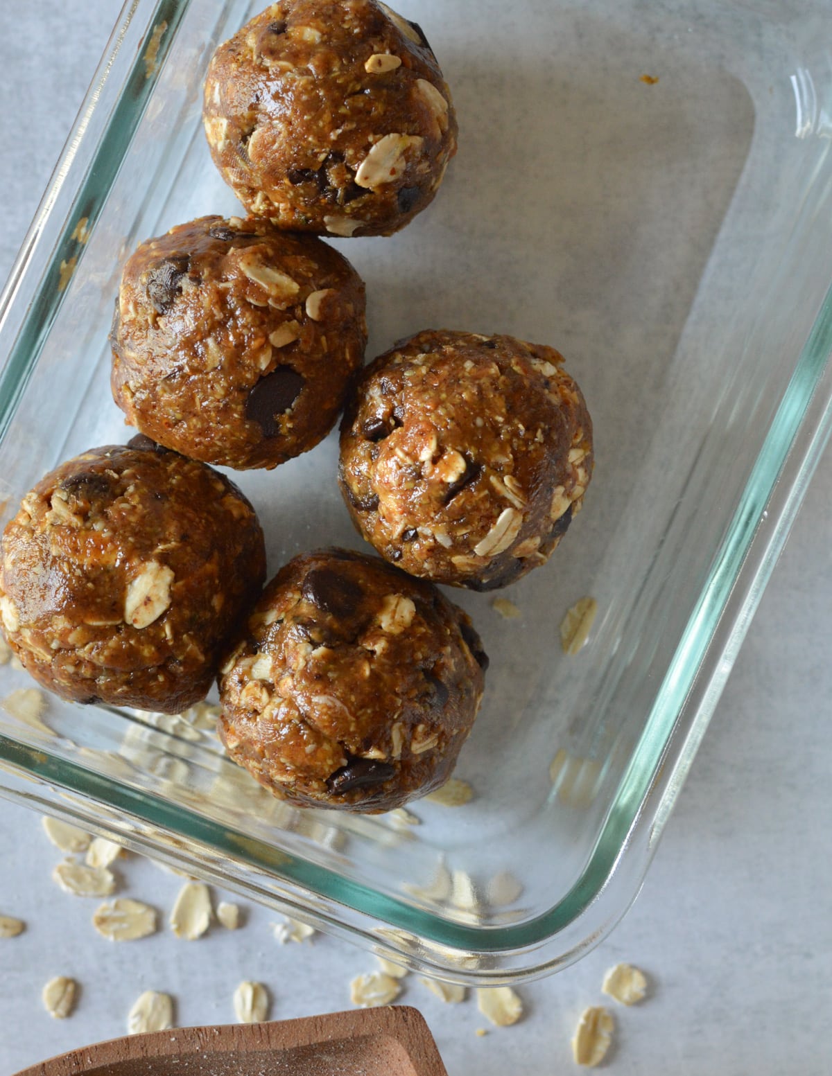 almond butter balls in a glass container