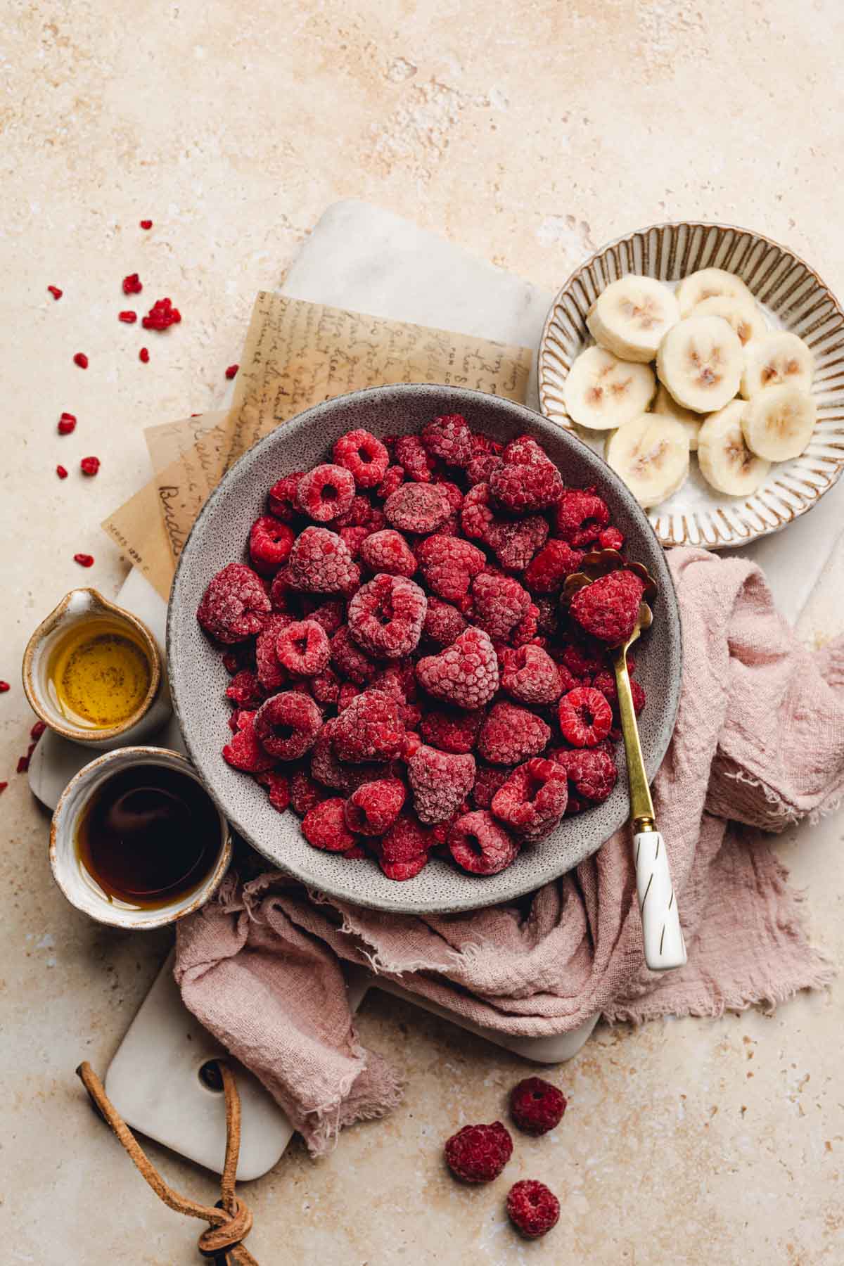frozen banana, frozen raspberries, maple syrup, apple juice.