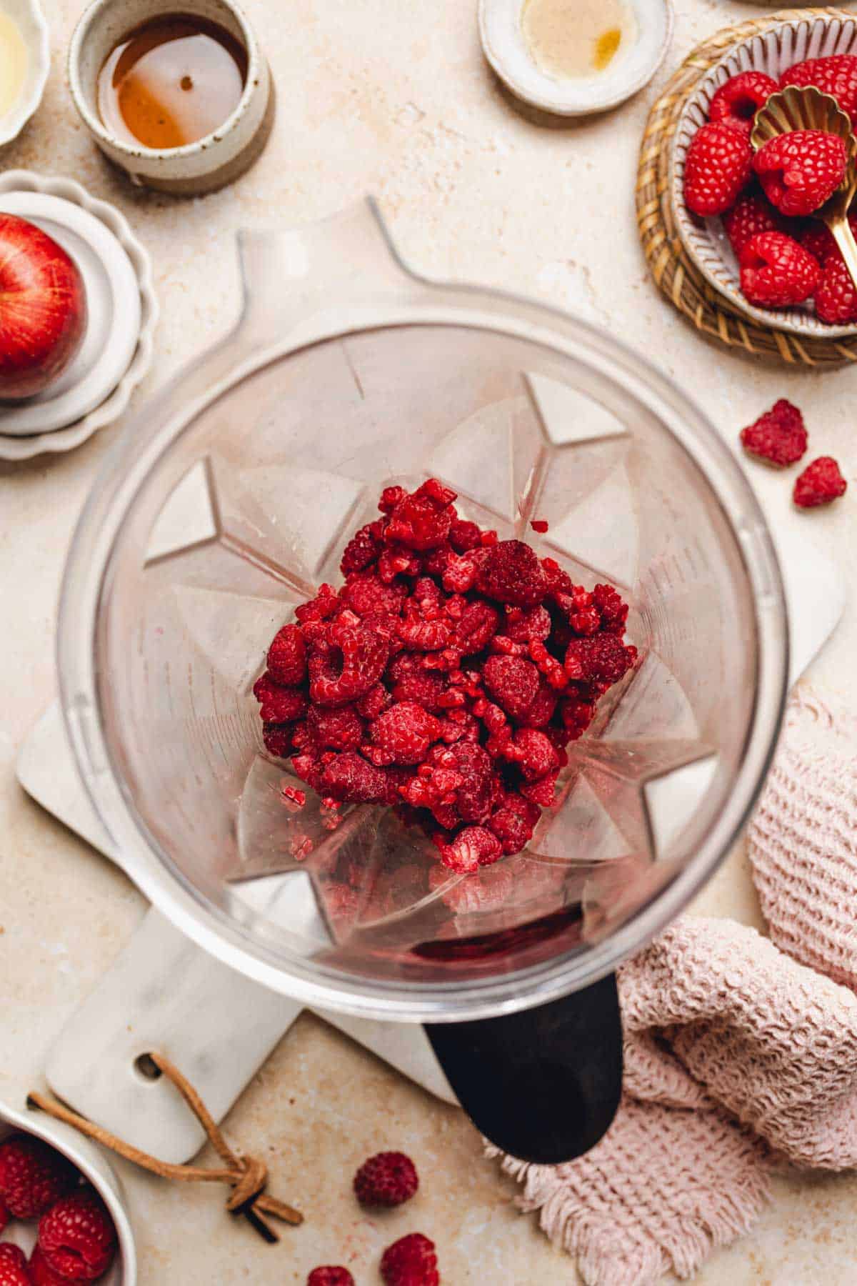 frozen raspberries in a blender.