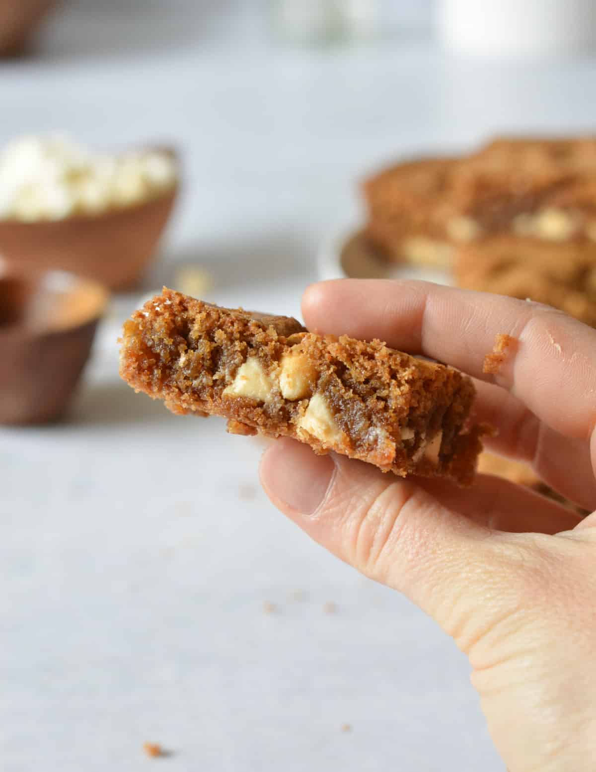 hand holding a gluten free blondie