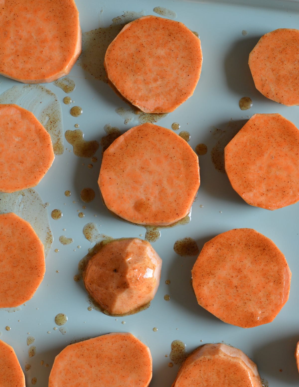 sliced sweet potatoes coated in maple syrup and butter.