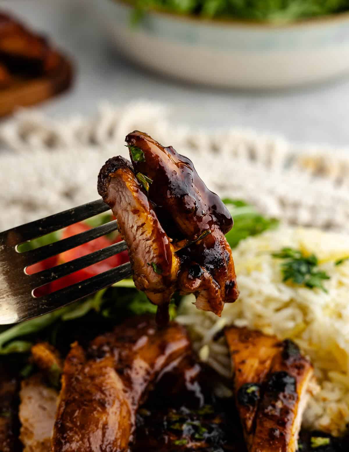 a forkful of honey chipotle chicken.
