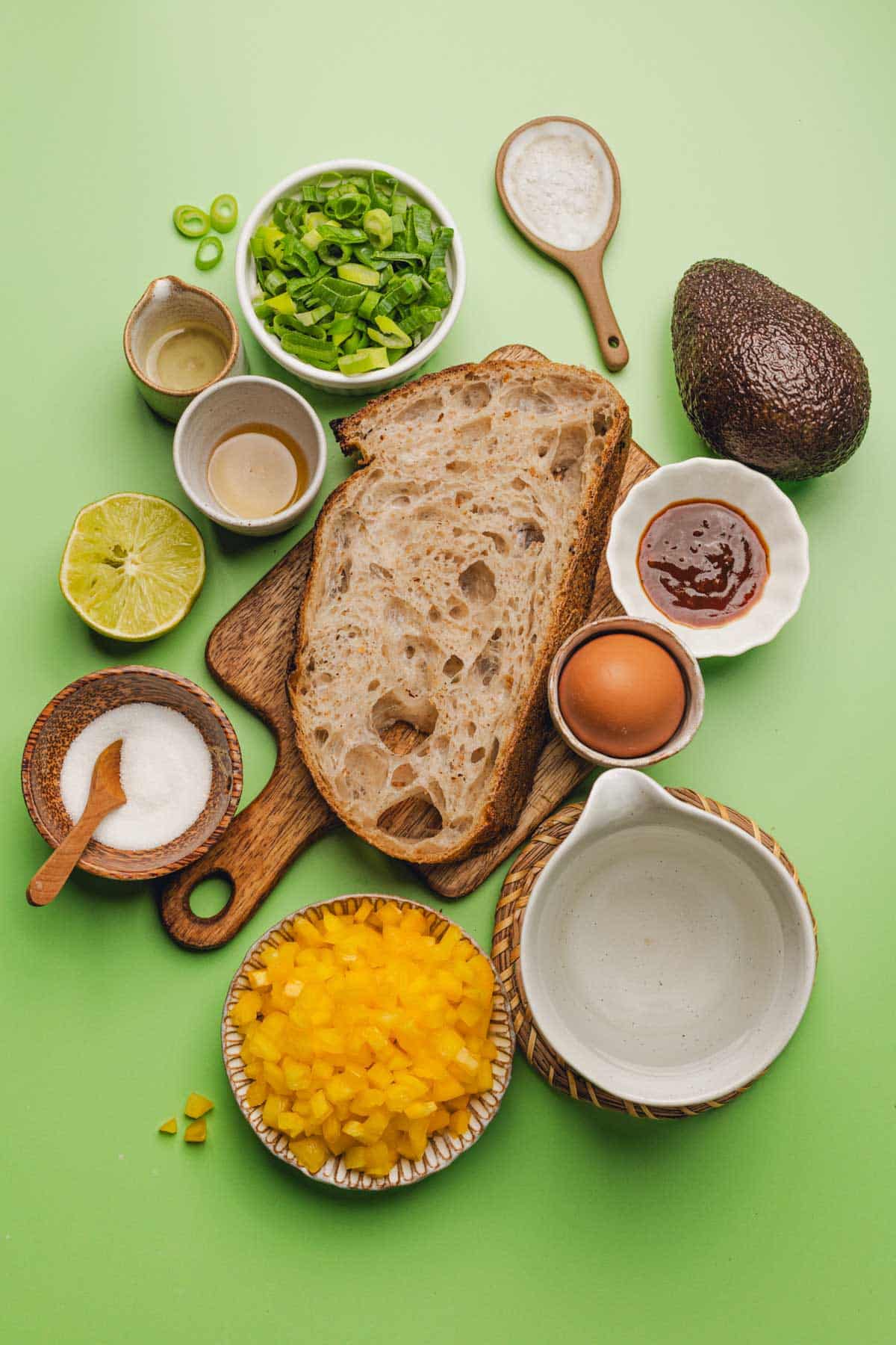 green onions, avocado, lime, sourdough bread, chipotle sauce, honey, yellow bell pepper, egg, salt,