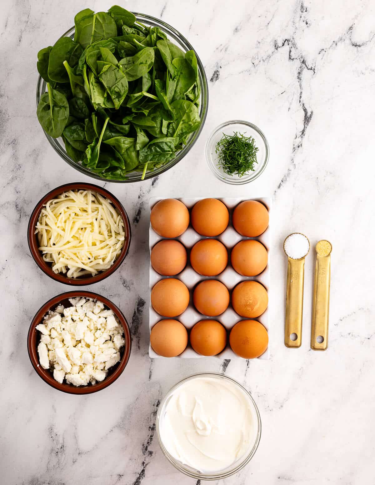 baby spinach, dill, eggs, feta, mozzarella, salt, sour cream, garlic powder.