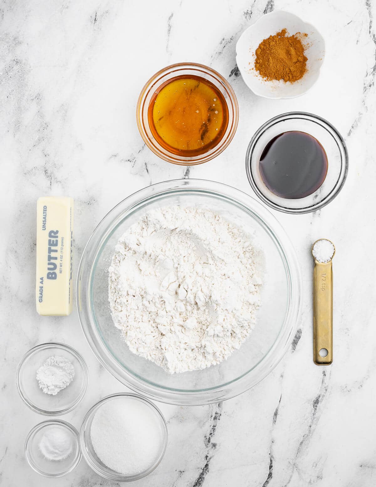 butter, gluten-free flour, honey, cinnamon, salt, water, sugar, baking powder, molasses, and water.