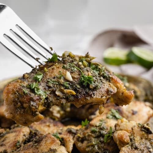 chimichurri chicken thighs on a plate.