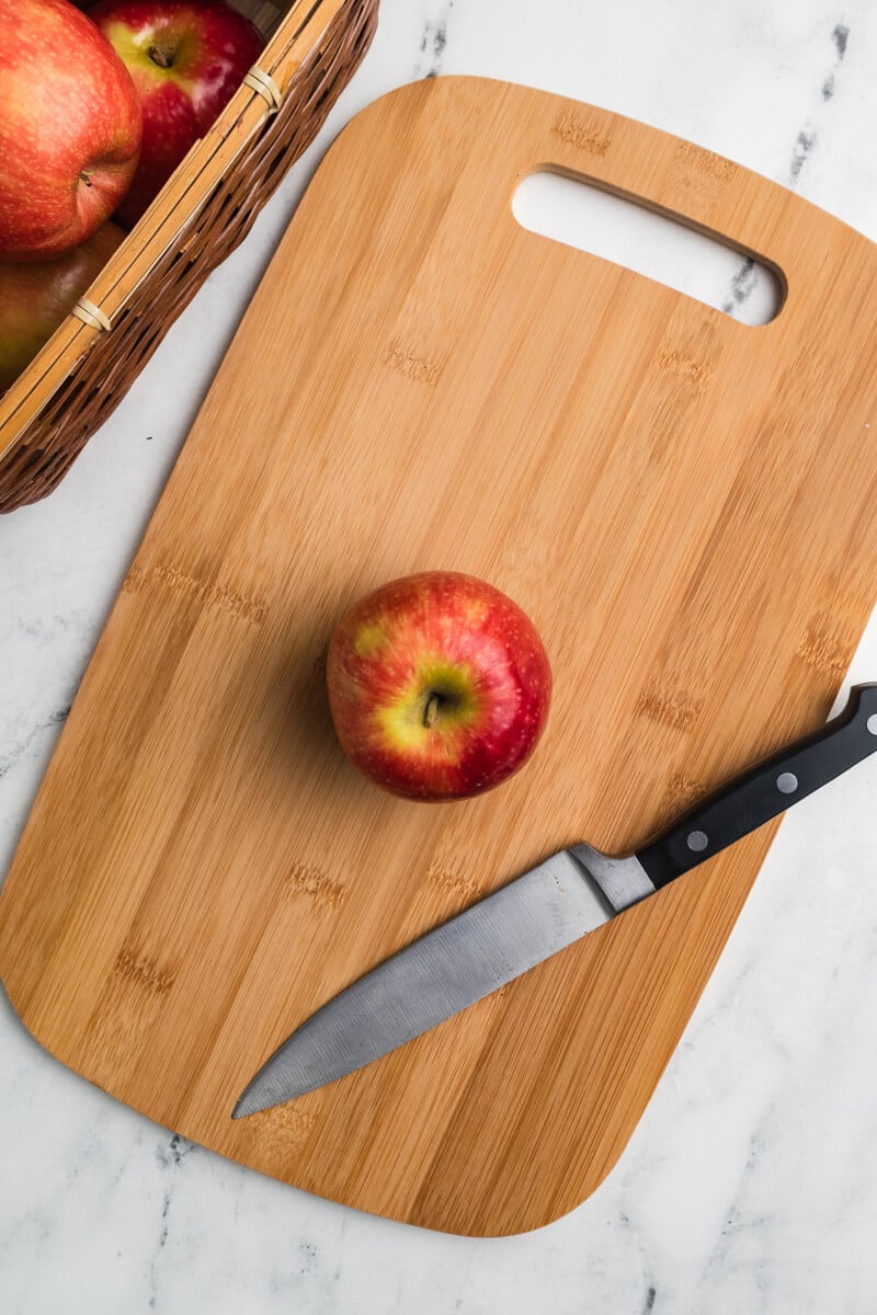apple on a cutting board.