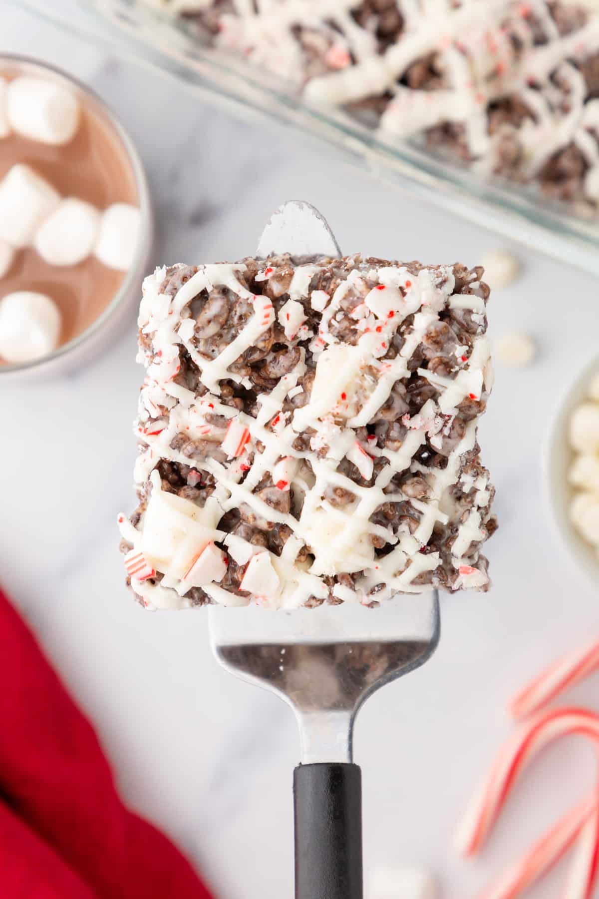 peppermint bark rice krispie treat on a spatula