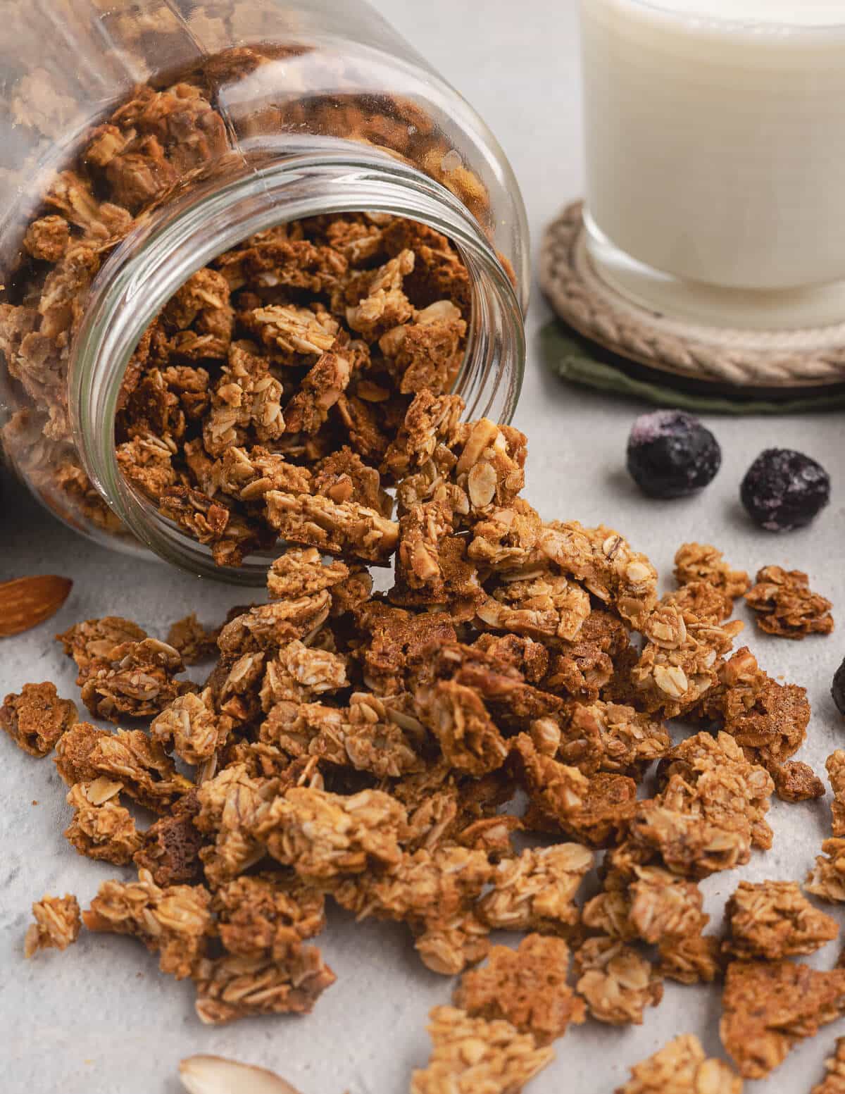 homemade granola spilling out of a jar