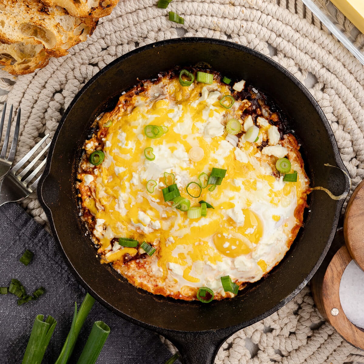 eggs with salsa in a skillet.