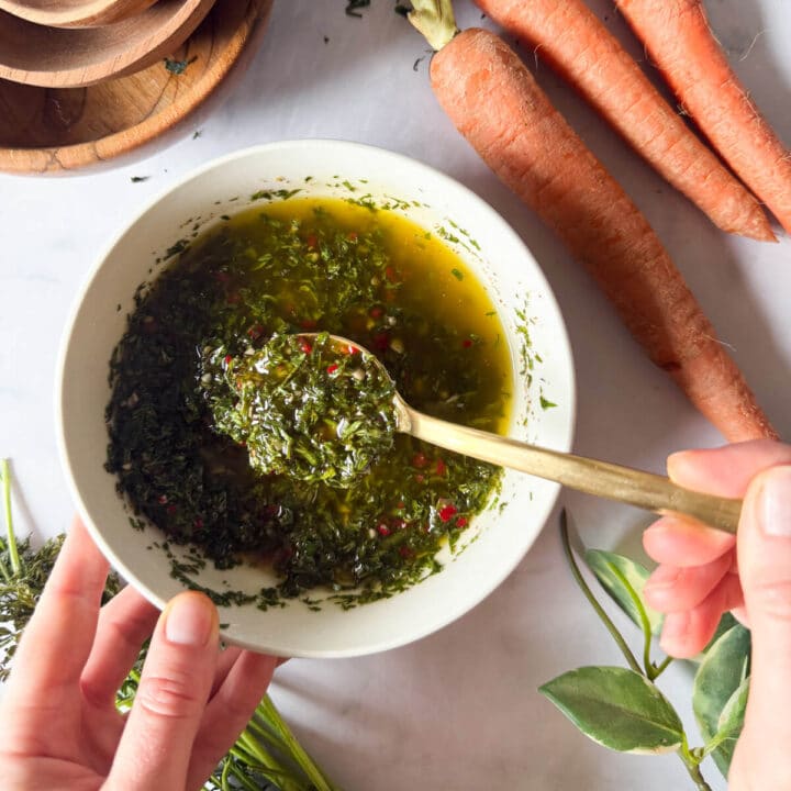 a bowl of chimichurri make from carrot greens