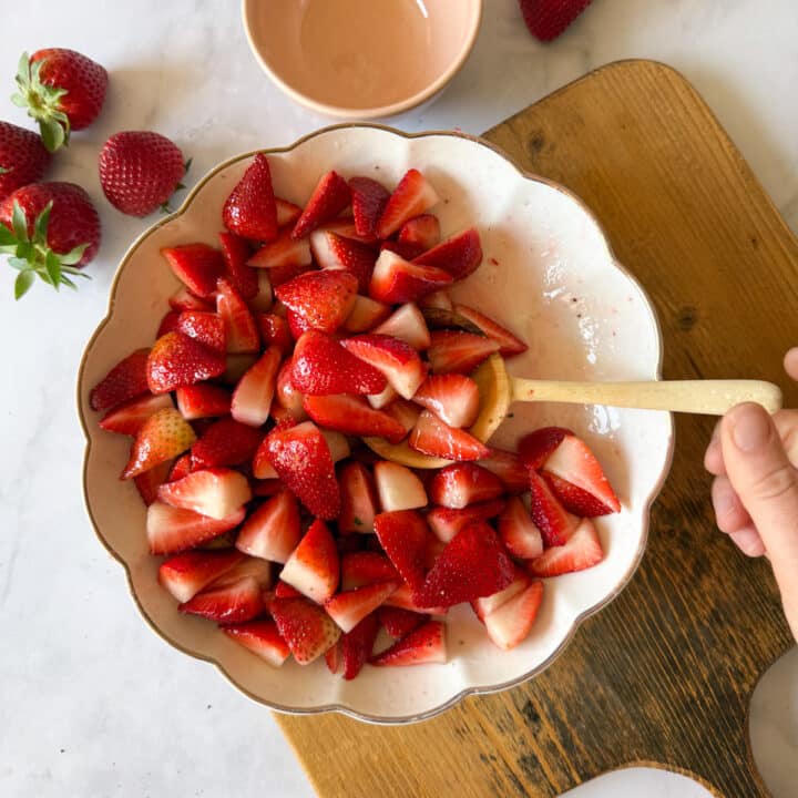 a bowl of macerated strawberries
