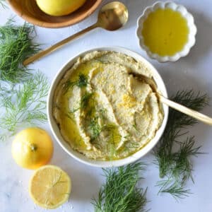 a bowl of homemade lemon dill hummus